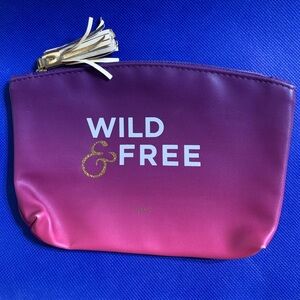 NWOT Ipsy WILD and FREE Cosmetic Bag with Tasseled Zipper. Cute!